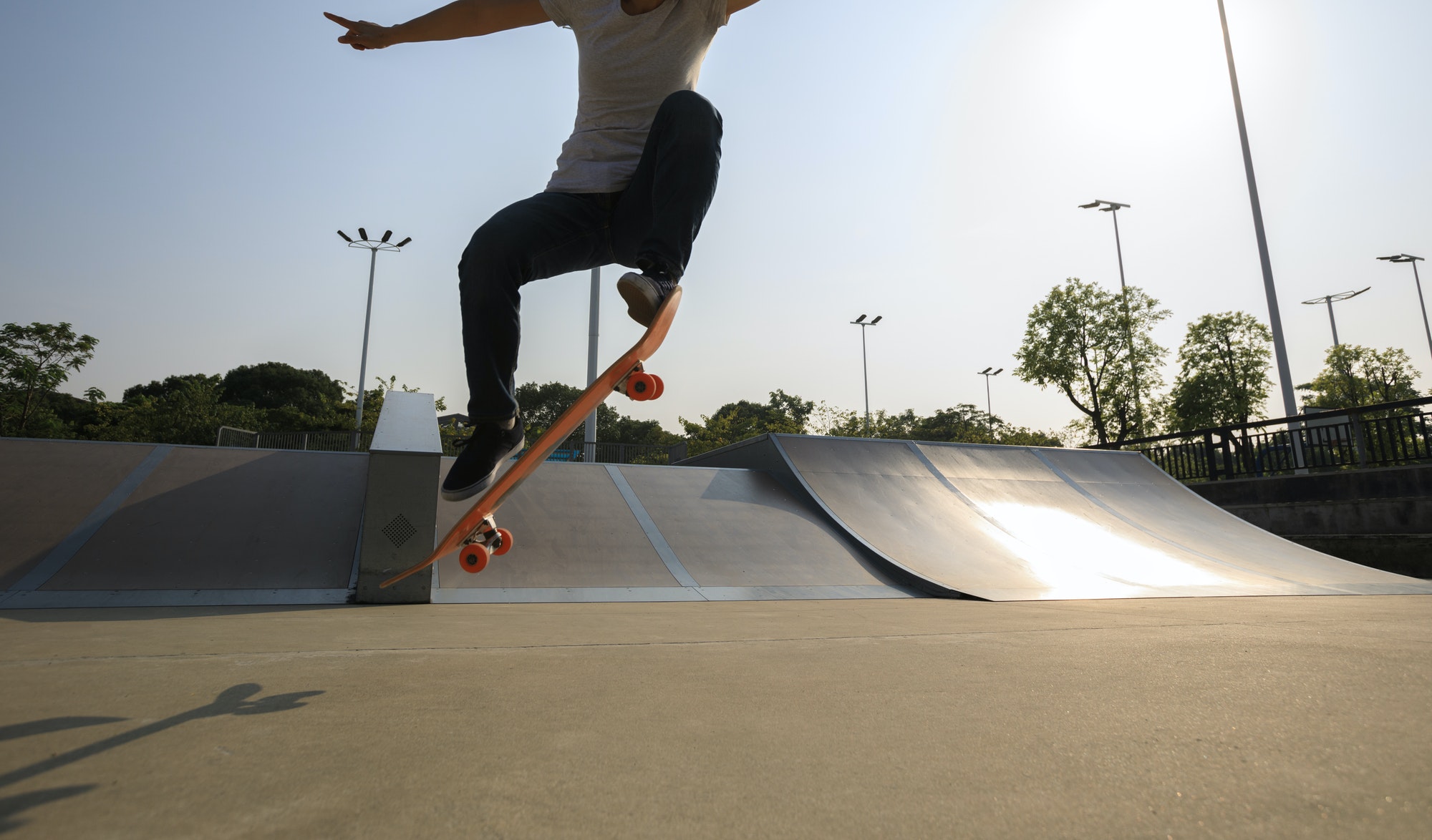woman skateboarding at skatepark